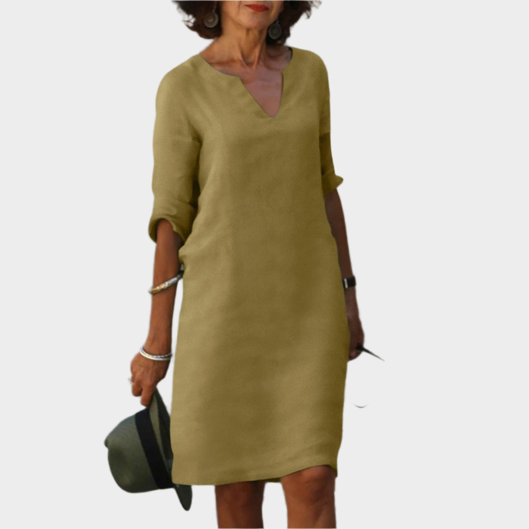 https://cdn.shopify.com/s/files/1/0937/3941/7945/files/Marjan_Stijlvolle_zomer_jurk_T-E14.jpg?v=1752775776