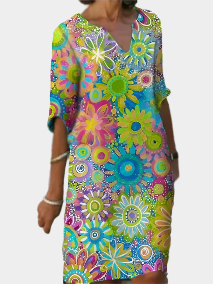 https://cdn.shopify.com/s/files/1/0937/3941/7945/files/TveD2024-Zomer-Halve-Mouwen-Bloem-Vintage-Dame-Mini-Jurk-Elegante-V-Hals-Pullover-Midi-Jurk-Witte_55dc2c9a-1cff-4efd-809b-6f57517638b9.webp?v=1752774917